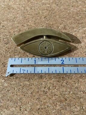 Brass Eye-Shaped Brooch with Sunburst Detail